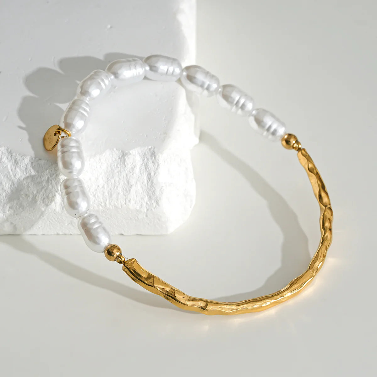 Bracelet doré mi jonc mi perle