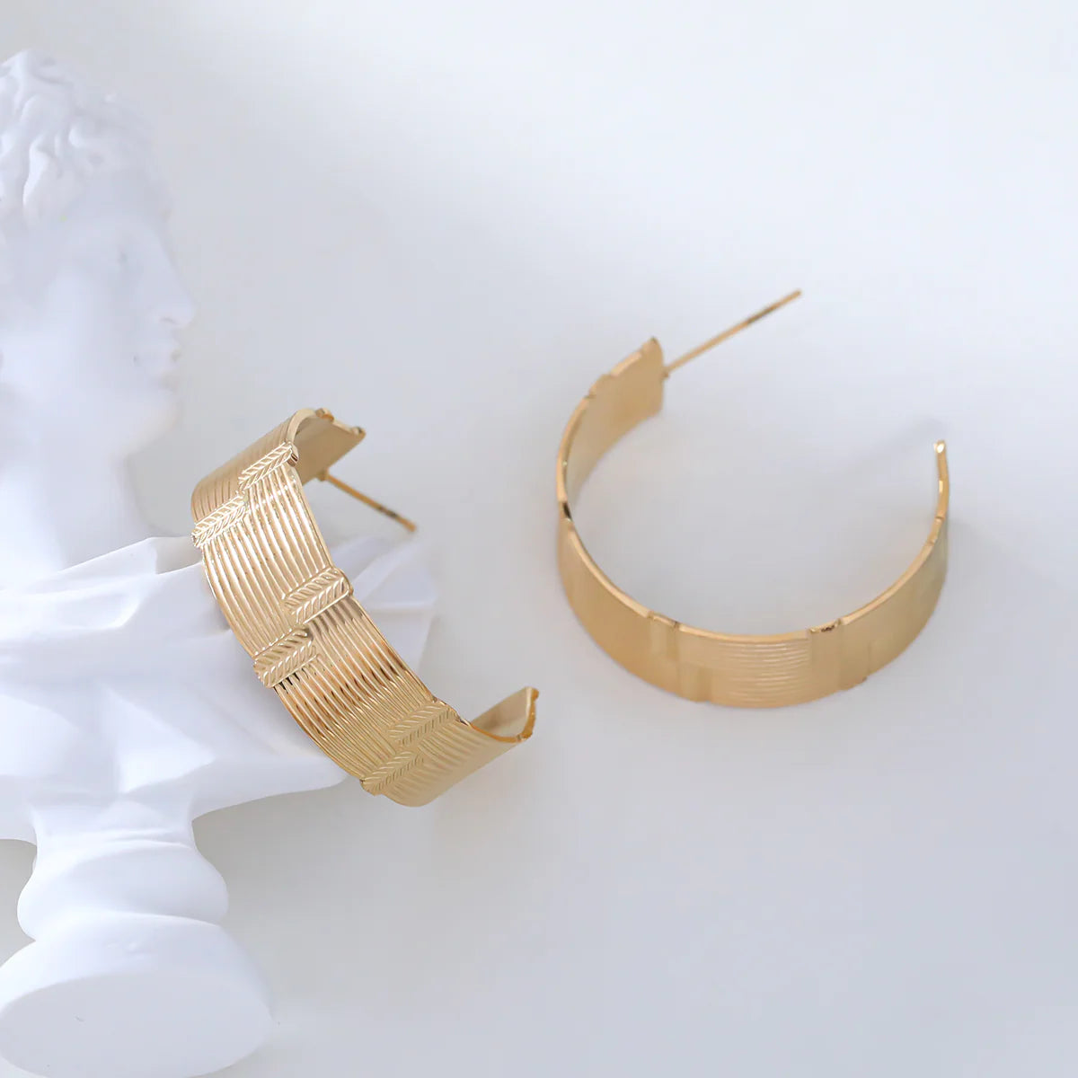 Boucles d'oreilles demi créoles large