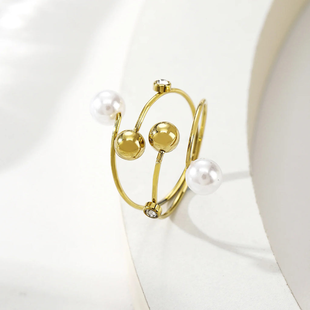 Bague fine lignes dorées avec strass et perle